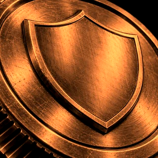 Medalhão 3D em bronze com um escudo em relevo: a patente Bronze